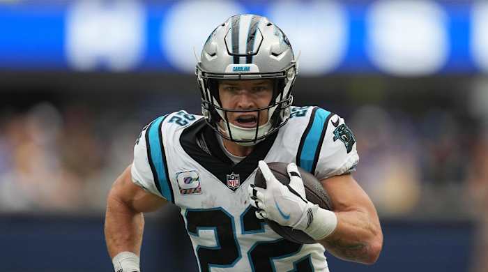 Oct 16, 2022; Inglewood, California, USA; Carolina Panthers running back Christian McCaffrey (22) carries the ball against the Los Angeles Rams in the first half at SoFi Stadium.